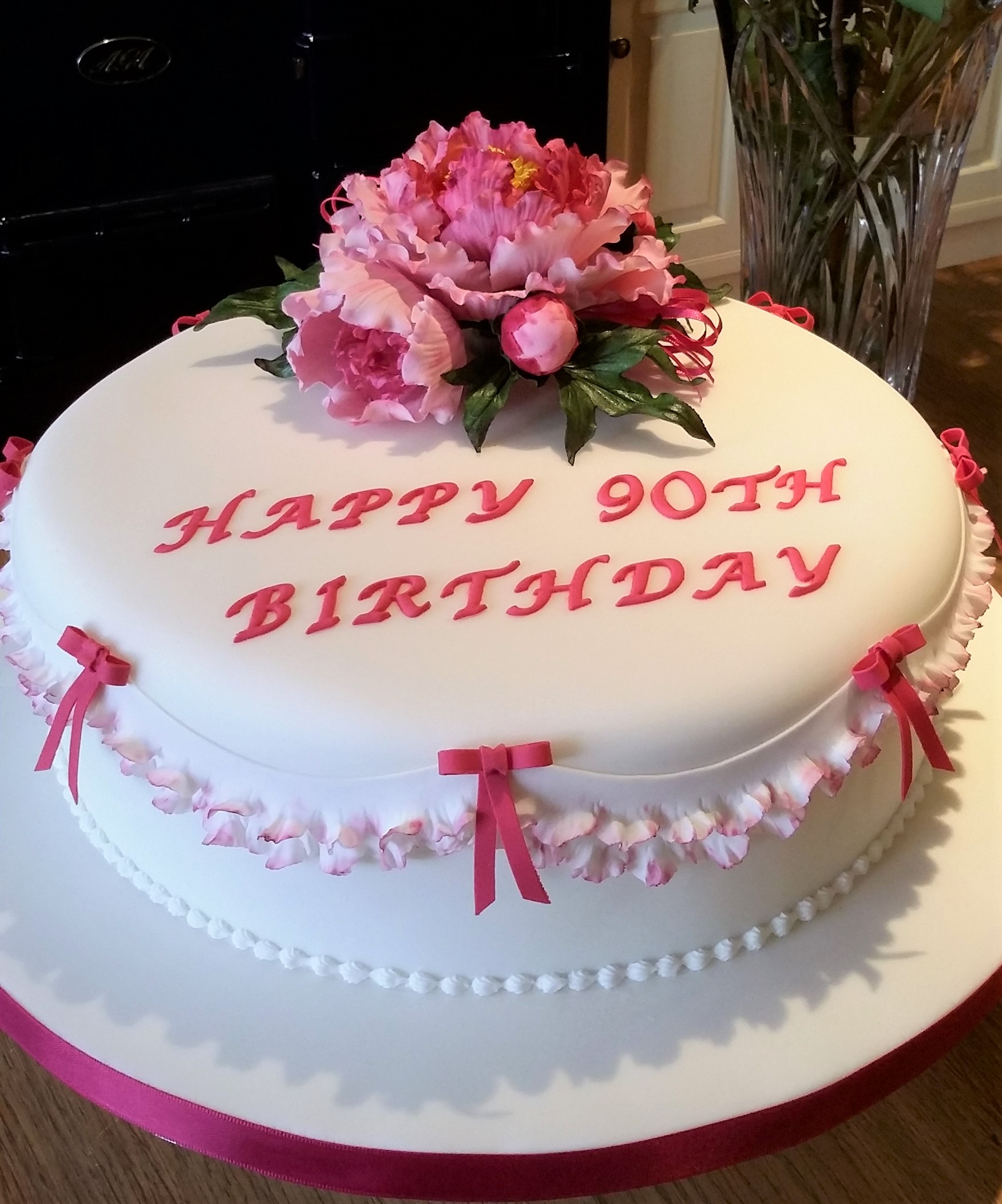 Rich fruit cake with sugar peony bouquet