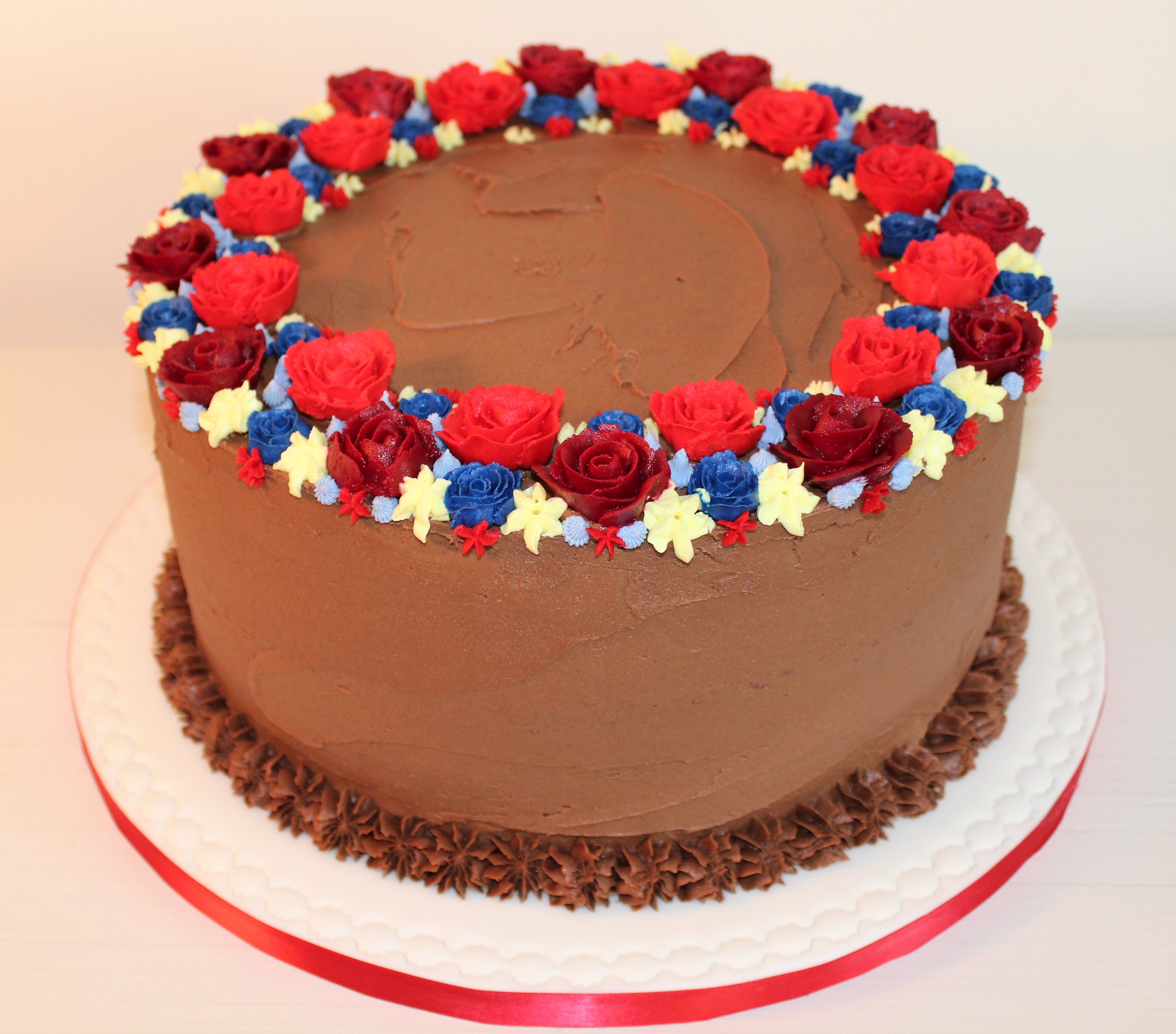 Rich chocolate cake with buttercream flowers