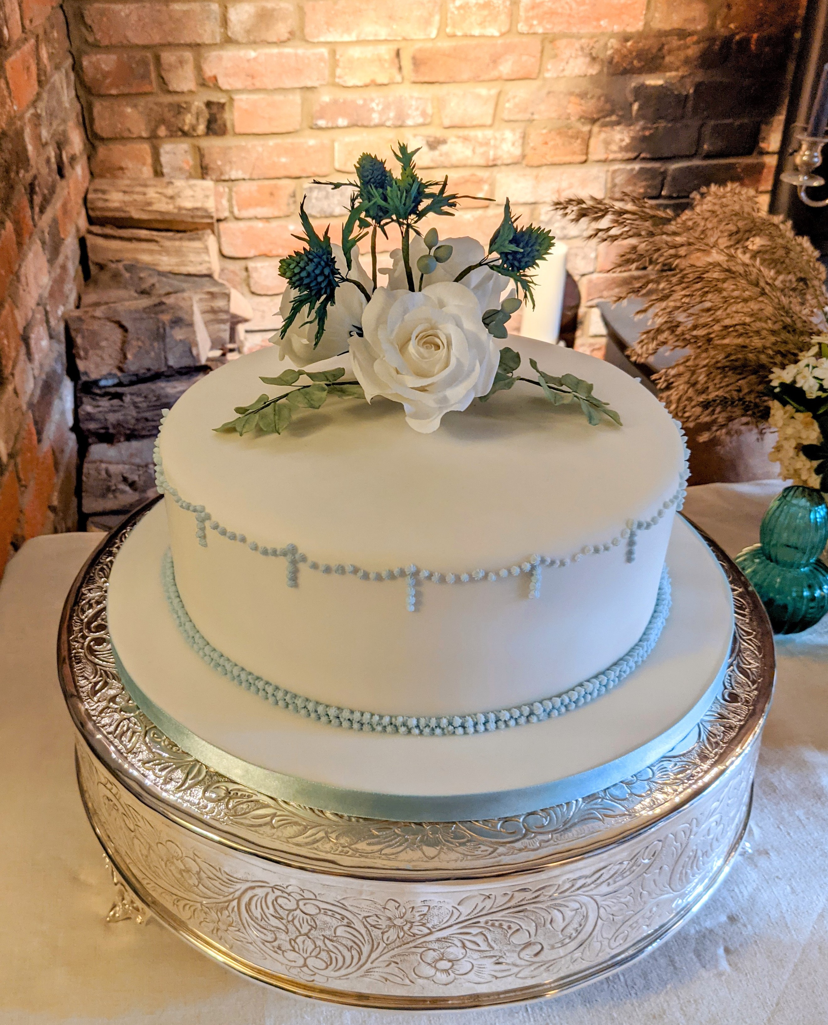 Rich fruit cake with fondant icing and sugar flowers